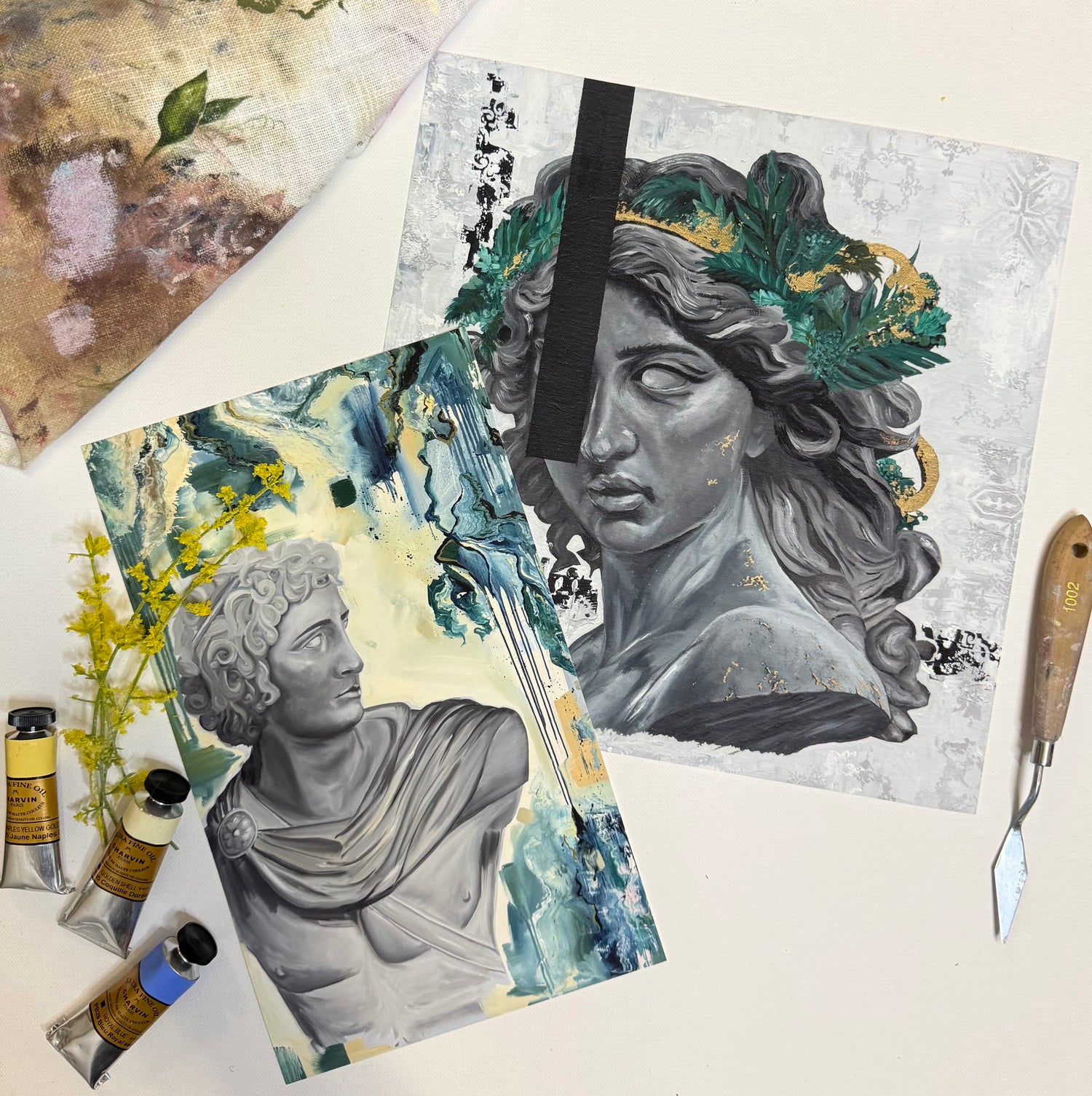 Two artistic prints of classical busts with paint tubes and a brush on a textured surface.  By Kendelle Ashton